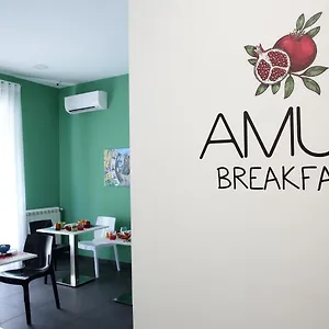Alojamento de Acomodação e Pequeno-almoço Amuri Room&suite